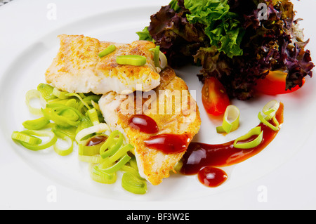Close-up of a dish of fish fillets Stock Photo