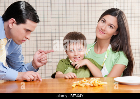 Man scolding his son Stock Photo