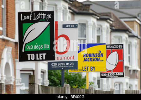 Row of To Let house property signs. London. UK 2009. Stock Photo