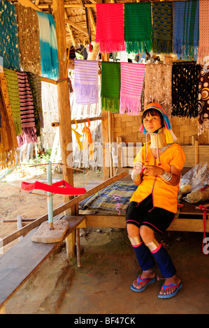 Thailand; Mae Hong Son Province; Nai Soi; Karen Tribe woman weaving, Stock Photo