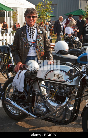 Rocker at show standing in front of british bikes Stock Photo - Alamy