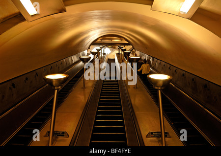 Nocturnal escalators in the subway station Tooting Broadway, Tooting, London, England, United Kingdom, Europe Stock Photo