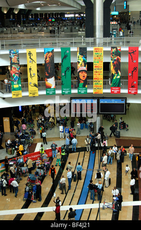 Travellers in the arrival hall of the O.R. Tambo International Airport (ORTIA), Johannesburg, South Africa