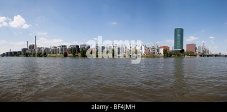 View over the Main River to Westhafen Tower from OFB with the bridge building and Westhafen House, designed by architects Schne Stock Photo