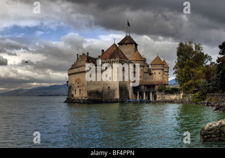 Chateau de Chillon (Chillon Castle) on the shore of Lake Geneva, Switzerland. Stock Photo