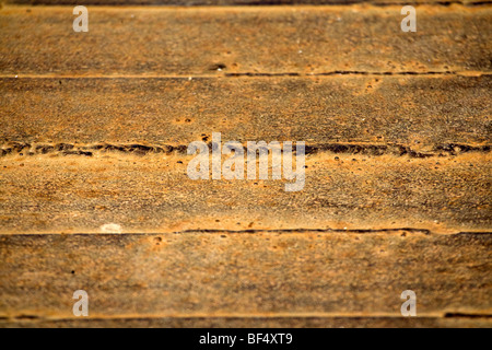 Rusting concrete wall with horizontal lines, close up detail Stock Photo