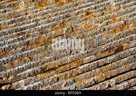 Weathered iron rods covered with rust and lime Stock Photo