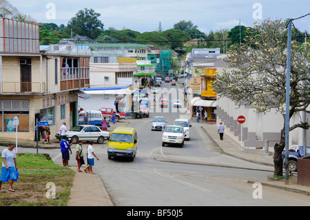 Busy traffic on a street in the centre of a small South Pacific island town. Stock Photo