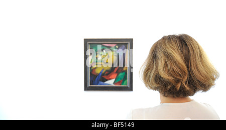 Visitor looking at the painting Der Tiger, 1912, oil on canvas by Franz Marc, special exhibition, Der Blaue Reiter, The Blue Ri Stock Photo