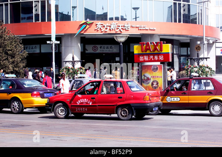 Taxi stop in front of Oriental Plaza, Wangfujing, Beijing, China Stock Photo