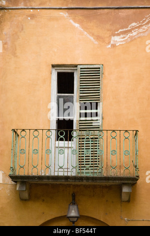 broken window shutter and veranda run down Italian House Stock Photo