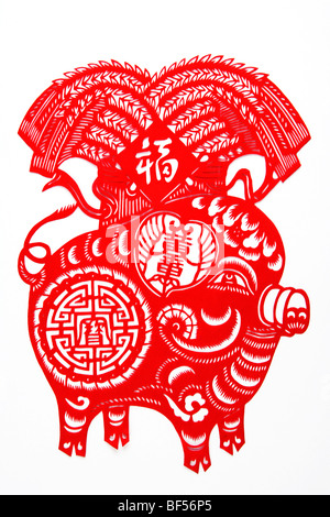 Paper Cutting piece with Chinese horoscope Pig, Beijing, China Stock Photo