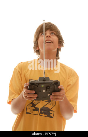 Boy, 16, holding a remote control for a model airplane Stock Photo