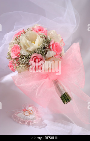 bride's bouquet with a pink bow Stock Photo