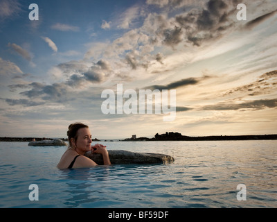 Woman in Myvatn Nature Baths, (Geothermal Hot Springs) Myvatn, Iceland Stock Photo