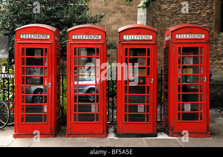 Four English red telephone booths, St. Mary's Street, Cambridge, Cambridgeshire, England, United Kingdom, Europe Stock Photo