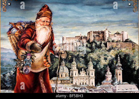 Santa Claus in front of a panoramic view of Salzburg, painted sign advertising a shop for Christmas decorations, Christmas, Jud Stock Photo