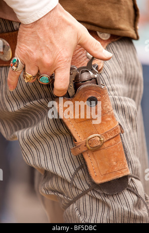 Creetown Country Music Festival, close up photograph of cowboys hand awaiting to draw gun in fastest draw competition. Dumfries Stock Photo