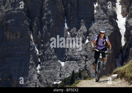 Mountain bike rider on a trail in the Parco naturale Fanes-Sennes-Braies, Veneto, South Tyrol, Italy, Europe