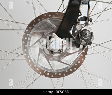 The front disc brake (Shimano) on an eZee Sprint electric bike Stock Photo