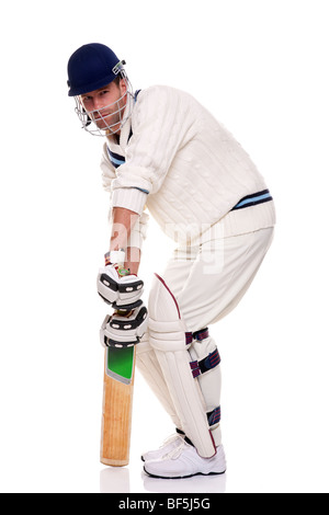 Cricketer, studio shot on white background. Stock Photo