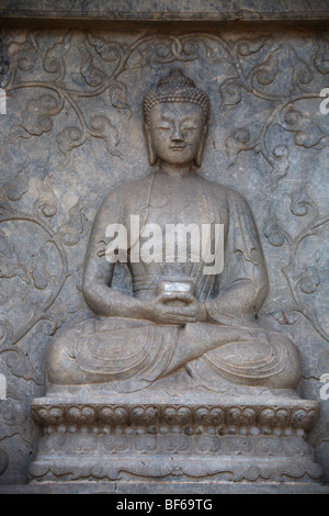 Marble screen wall carving of Shakyamuni in Vajrasana Pagoda, Biyun Temple, Fragrant Hills, Beijing, China Stock Photo