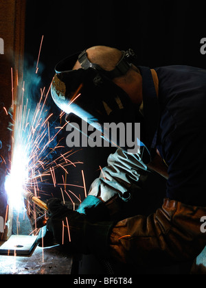 Welder Welding at an Engineering Works Stock Photo