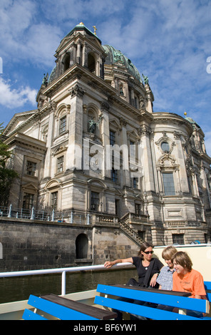 Excursion boat on river Spree in front of Dom cathedral in Berlin, Germany Stock Photo