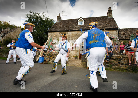 Morris Dancers outside the Victoria Inn, Eastleach, Gloucestershire, UK Stock Photo