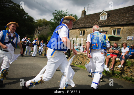 Morris Dancers outside the Victoria Inn, Eastleach, Gloucestershire, UK Stock Photo