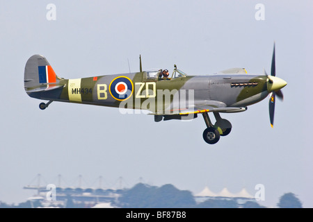 A Spitfire Mk IXB landing at Goodwood airfield, Sussex, England, UK 2009 Stock Photo