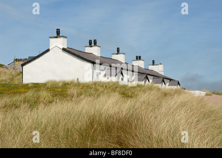 Terrace of Pilot's Cottages on Ynys Llanddwyn on Anglesey Stock Photo