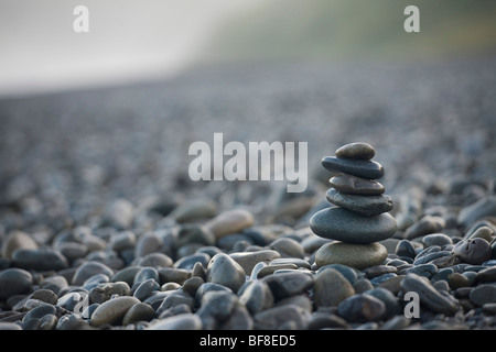 stack of sea stones on rocky beach, Stock Photo