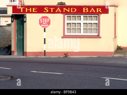road sign painted on Traditional Irish pub in southwest Ireland Stock Photo