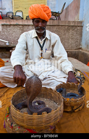 Cobra Charmer at the Pushkar Mela in Pushkar in Rajasthan India Stock Photo