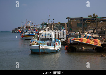 fishing boats tied up in potamos typical small unspoilt fishing village republic of cyprus europe Stock Photo