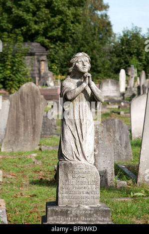 Statue on grave in Kensal Green Cemetery, London, UK Stock Photo