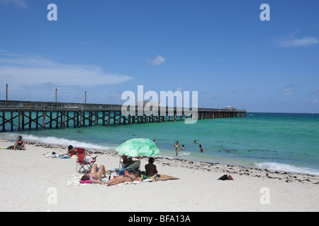 A recreational beach nest to a long pier, Miami Beach, Florida, USA. Stock Photo