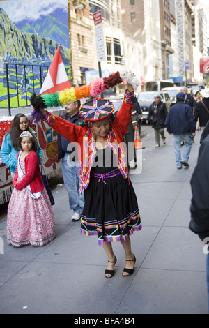 2009: Hispanic Day Parade in NYC. Peruvian Woman dances on the sidewalk. Stock Photo