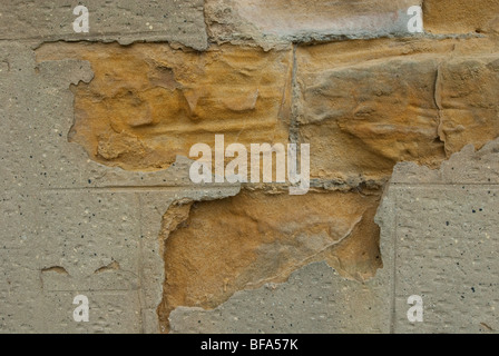 Sandstone wall showing corrosion by Acid Rain Stock Photo