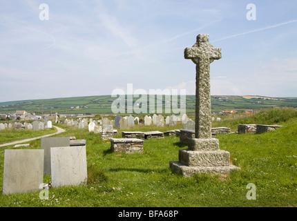 Stone cross in a churchyard near Tintagel north Cornwall England Stock Photo