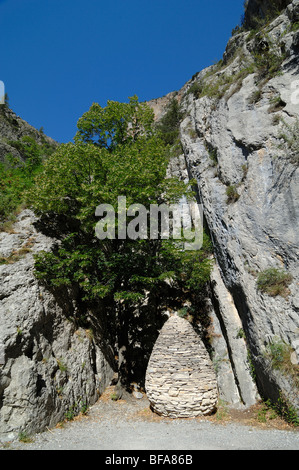 Stone Cone Sculpture known as the Sentinel by Andy Goldsworthy in the Clue de Barles Alpes-de-Haute-Provence Provence France Stock Photo