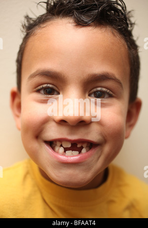 Boy smiling with 2nd set of teeth Stock Photo