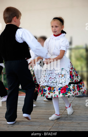 Svab Hungarian children in traditional costume at the Hajos wine festival, Hungary Stock Photo