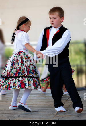 Svab Hungarian children in traditional costume at the Hajos wine festival, Hungary Stock Photo