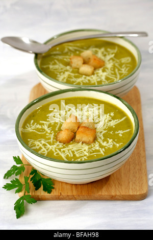 Pumpkin and spinach soup. Recipe available. Stock Photo