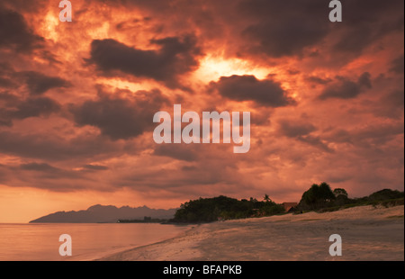 A spectacular sunset on Pantai Tengah beach in Langkawi, Malaysia. Stock Photo