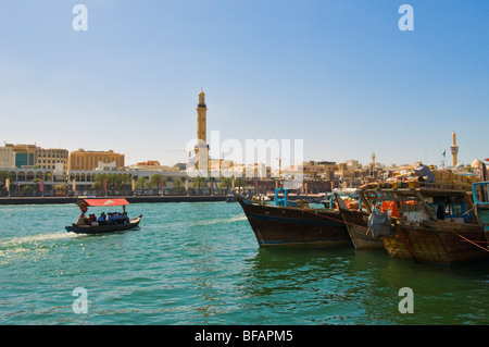 Dubai Creek abra boat with views over to the Grand Mosque Minaret ...