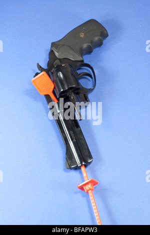 Handgun with barrel-lock. Visibly easy to see that the gun is secure and can't be fired. .357 Magnum revolver. Stock Photo