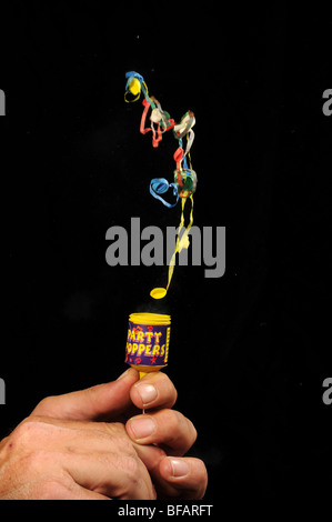 Party popper popping Stock Photo